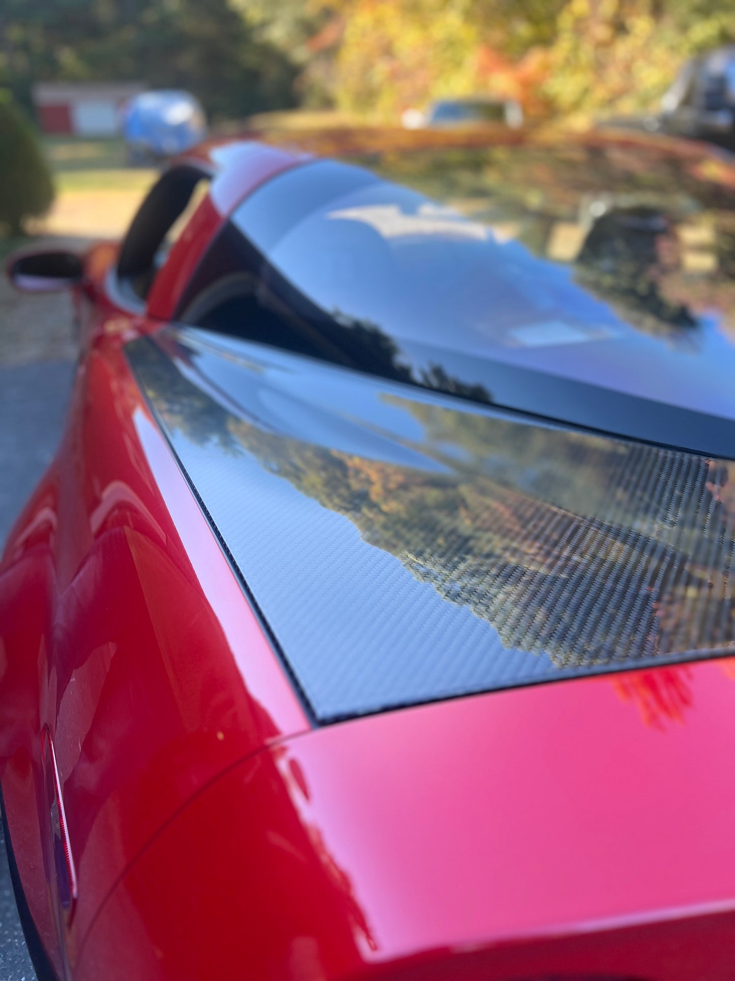 Close-up of a red car with a blurred background